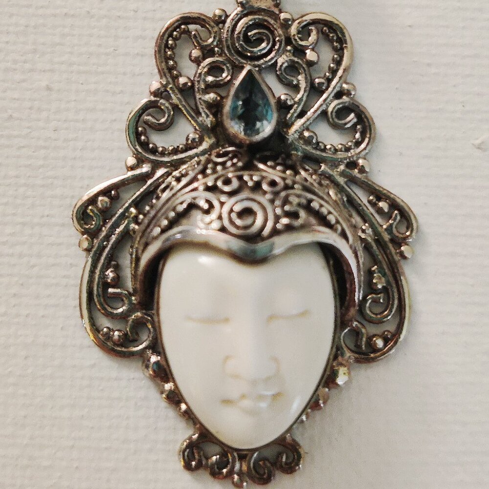 Sterling silver goddess necklace w/ blue topaz